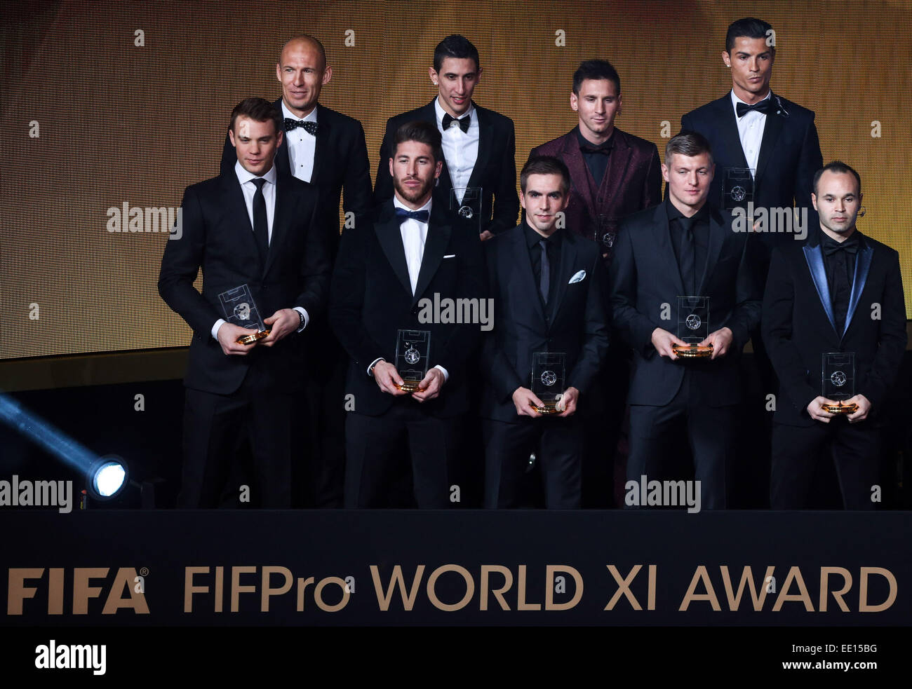 Zurich, Switzerland. 12th Jan, 2015. Winners of the FIFA FIFPro WORLD XI Award of the year 2014: Manuel Neuer, Sergio Ramos, Philipp Lahm, Toni Kroos and Andres Iniesta(first row L to R), Arjen Robben, Angel Di Maria, Lionel Messi and Cristiano Ronaldo(back row L to R), pose with their trophies during the FIFA Ballon d'Or award ceremony at the Kongresshaus in Zurich, Switzerland, Jan. 12, 2015. Credit:  Zhang Fan/Xinhua/Alamy Live News Stock Photo