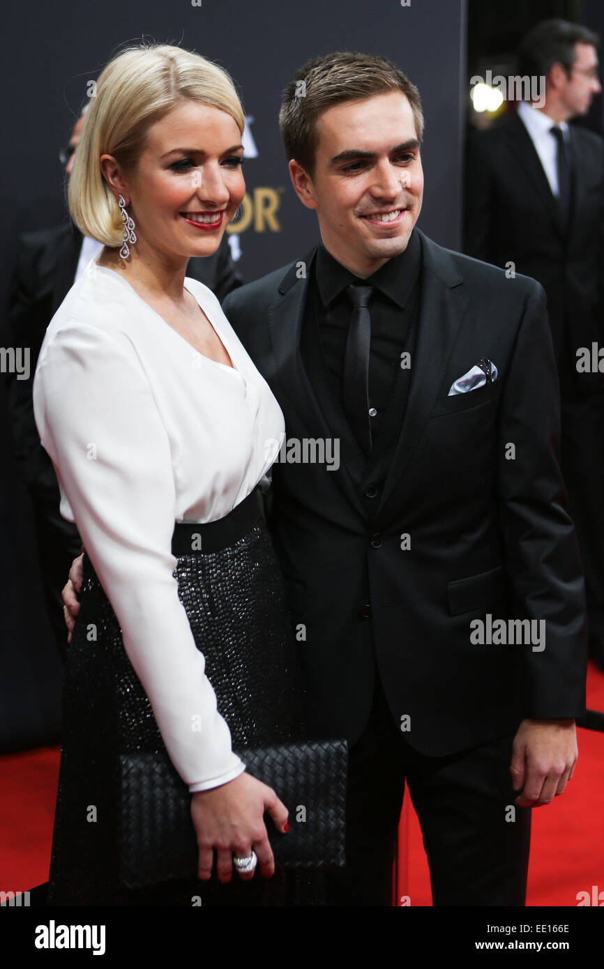 Zurich, Switzerland. 12th Jan, 2015. Philipp Lahm (R) of Germany poses with his wife on the red carpet ahead of the 2014 FIFA Ballon d'Or award ceremony in Zurich, Switzerland, Jan. 12, 2015. Credit:  Zhang Fan/Xinhua/Alamy Live News Stock Photo