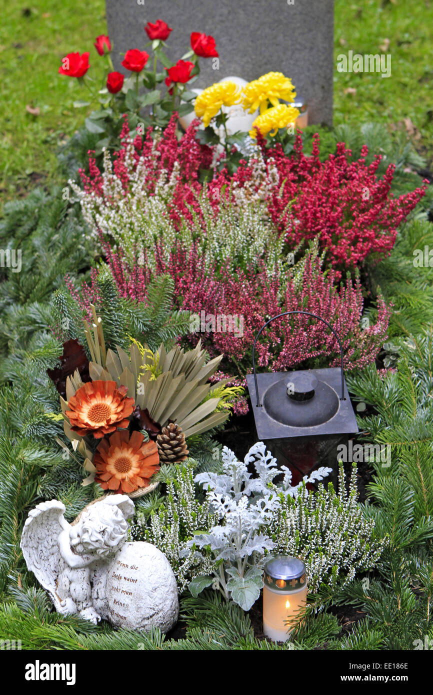 Geschmuecktes Grab auf einem Friedhof an Allerheiligen Stock Photo
