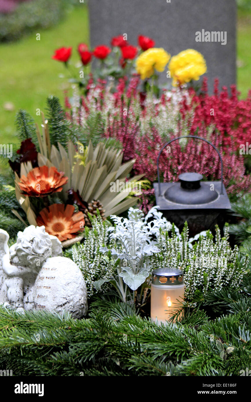 Geschmuecktes Grab auf einem Friedhof an Allerheiligen Stock Photo