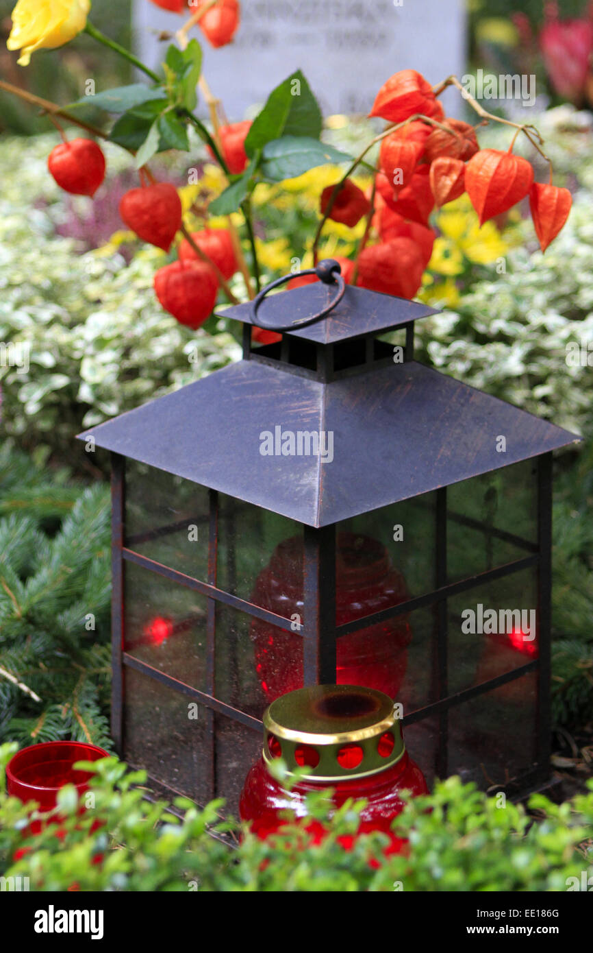 Geschmuecktes Grab auf einem Friedhof an Allerheiligen Stock Photo