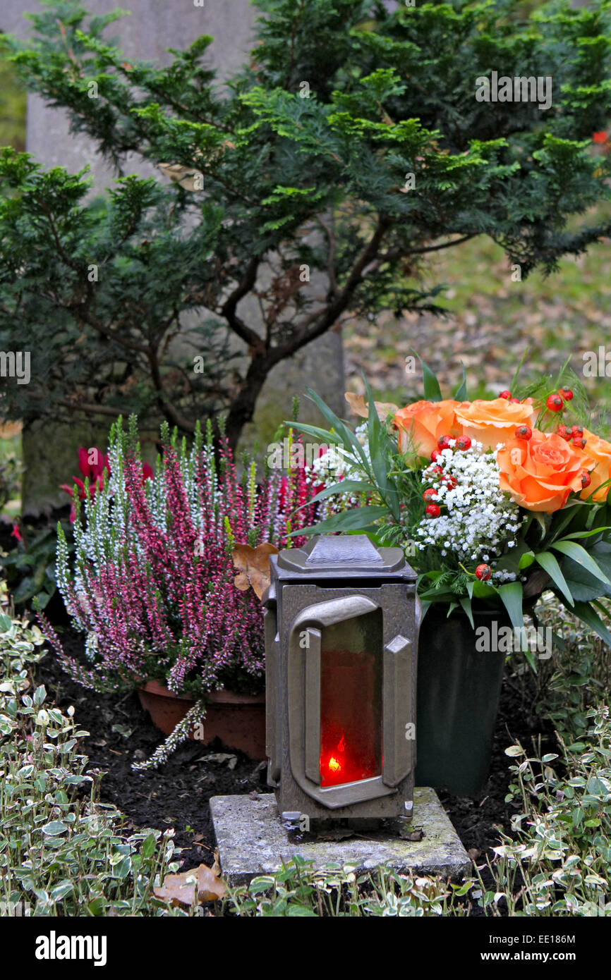 Geschmuecktes Grab auf einem Friedhof an Allerheiligen Stock Photo