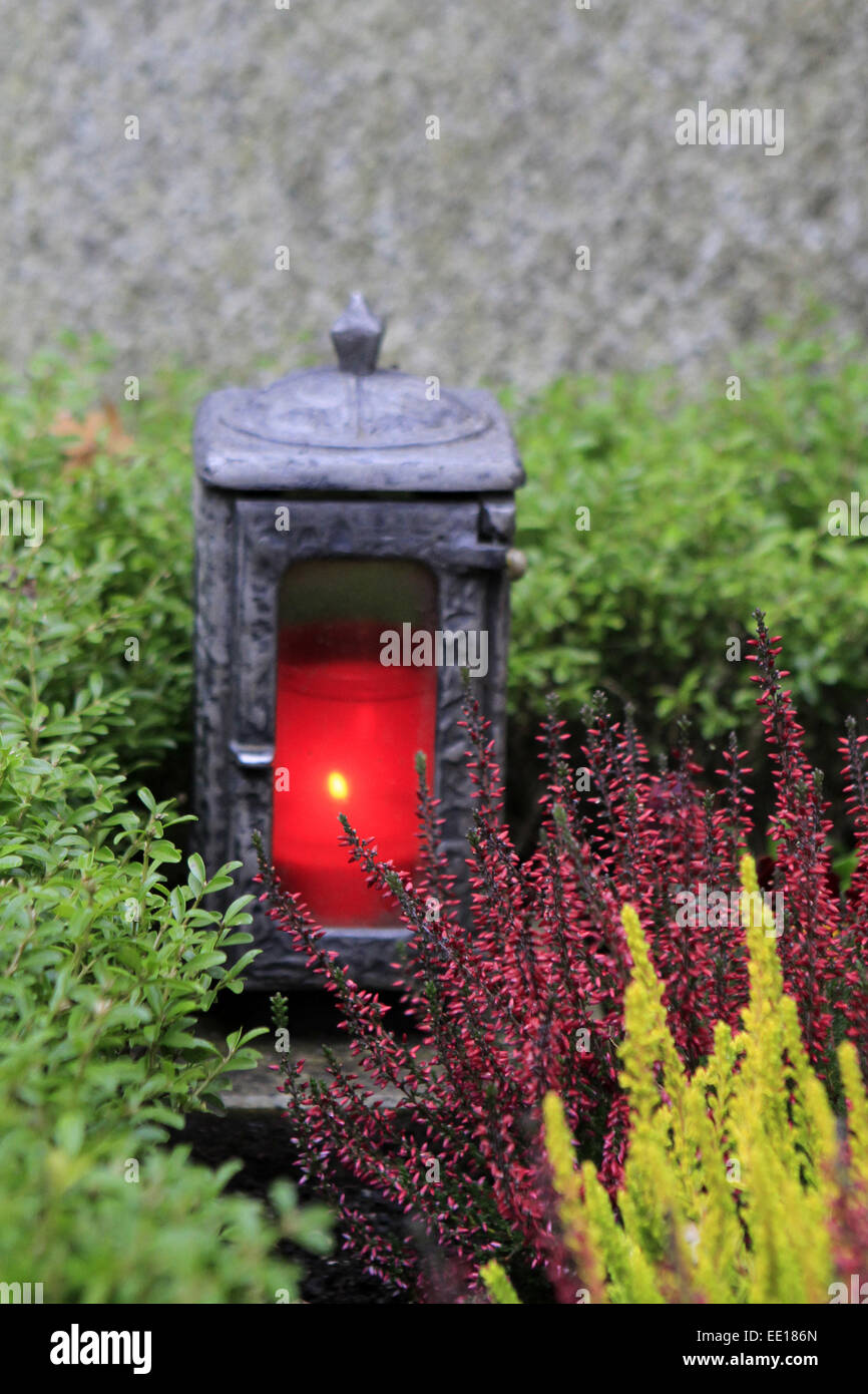 Geschmuecktes Grab auf einem Friedhof an Allerheiligen Stock Photo