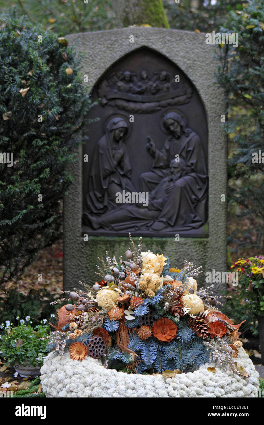 Geschmuecktes Grab auf einem Friedhof an Allerheiligen Stock Photo