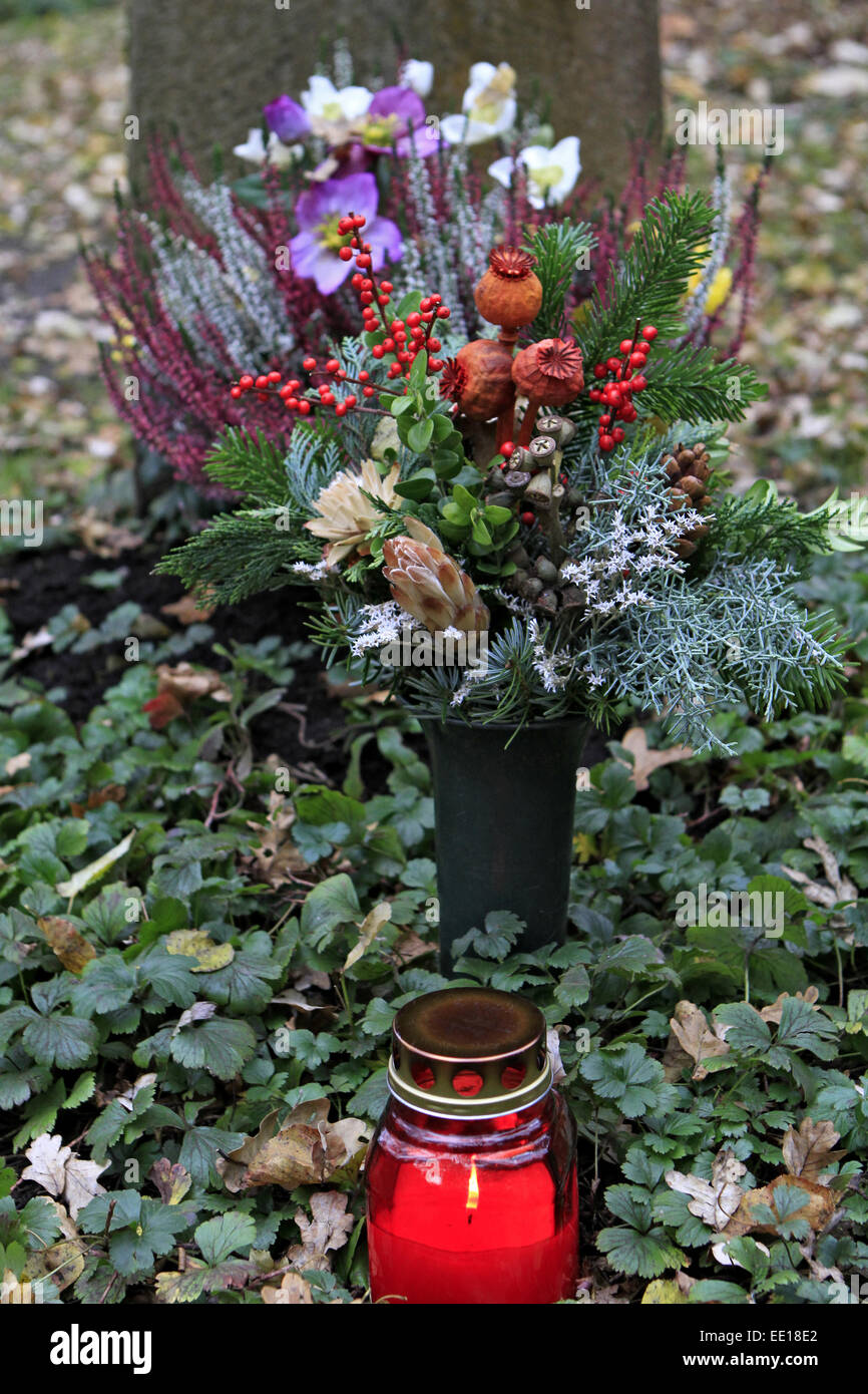 Geschmuecktes Grab auf einem Friedhof an Allerheiligen Stock Photo