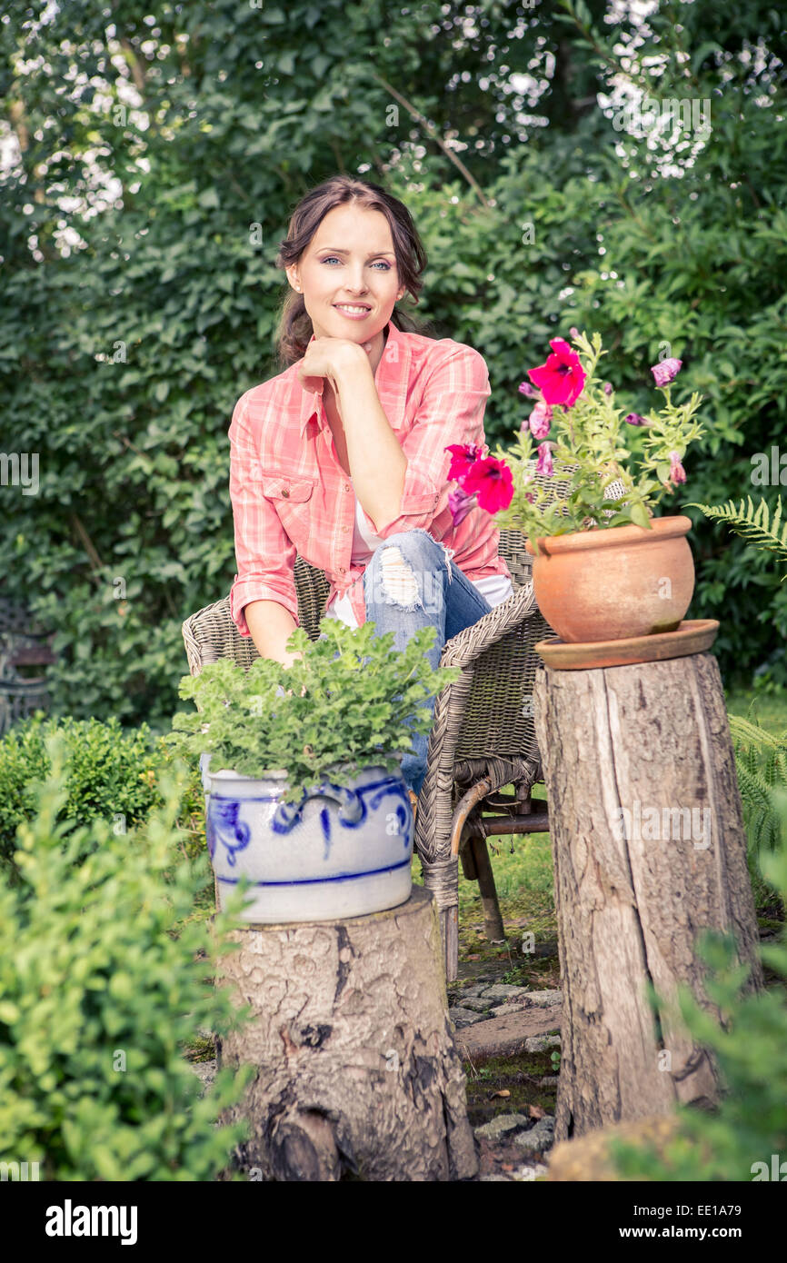 portrait of a young woman in the garden Stock Photo - Alamy