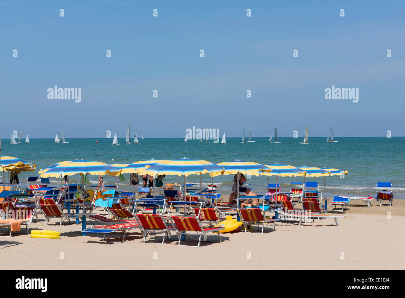 People sunbathing on the beach, beach chairs, sunshades, sea, Senigallia, Province of Ancona, Marche, Adriatic, Italy Stock Photo