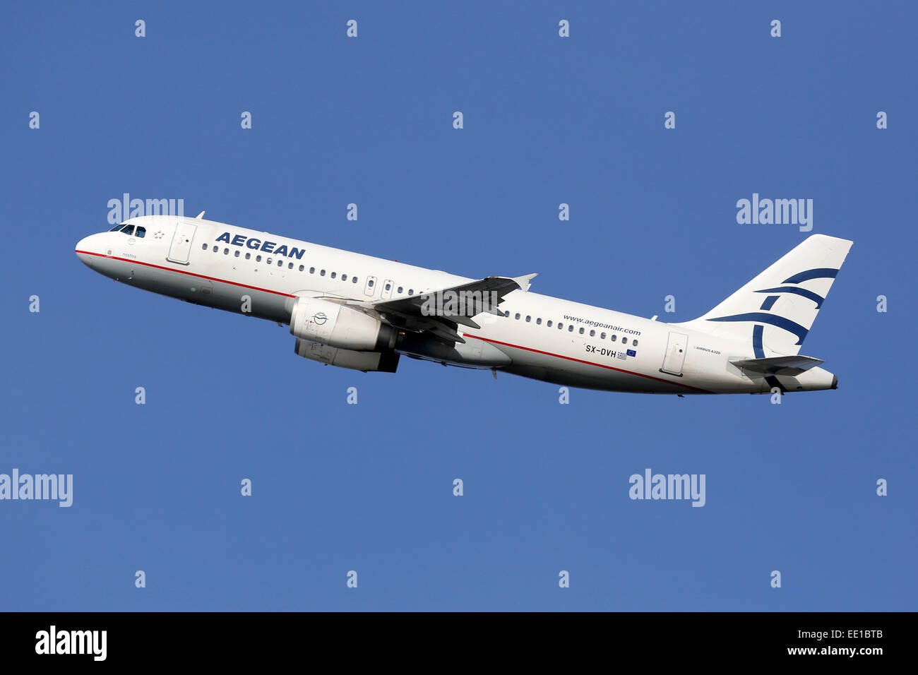 Barcelona, Spain - December 12, 2014: An Aegean Airlines Airbus A320 aircraft with the registration SX-DVH taking off from Barce Stock Photo