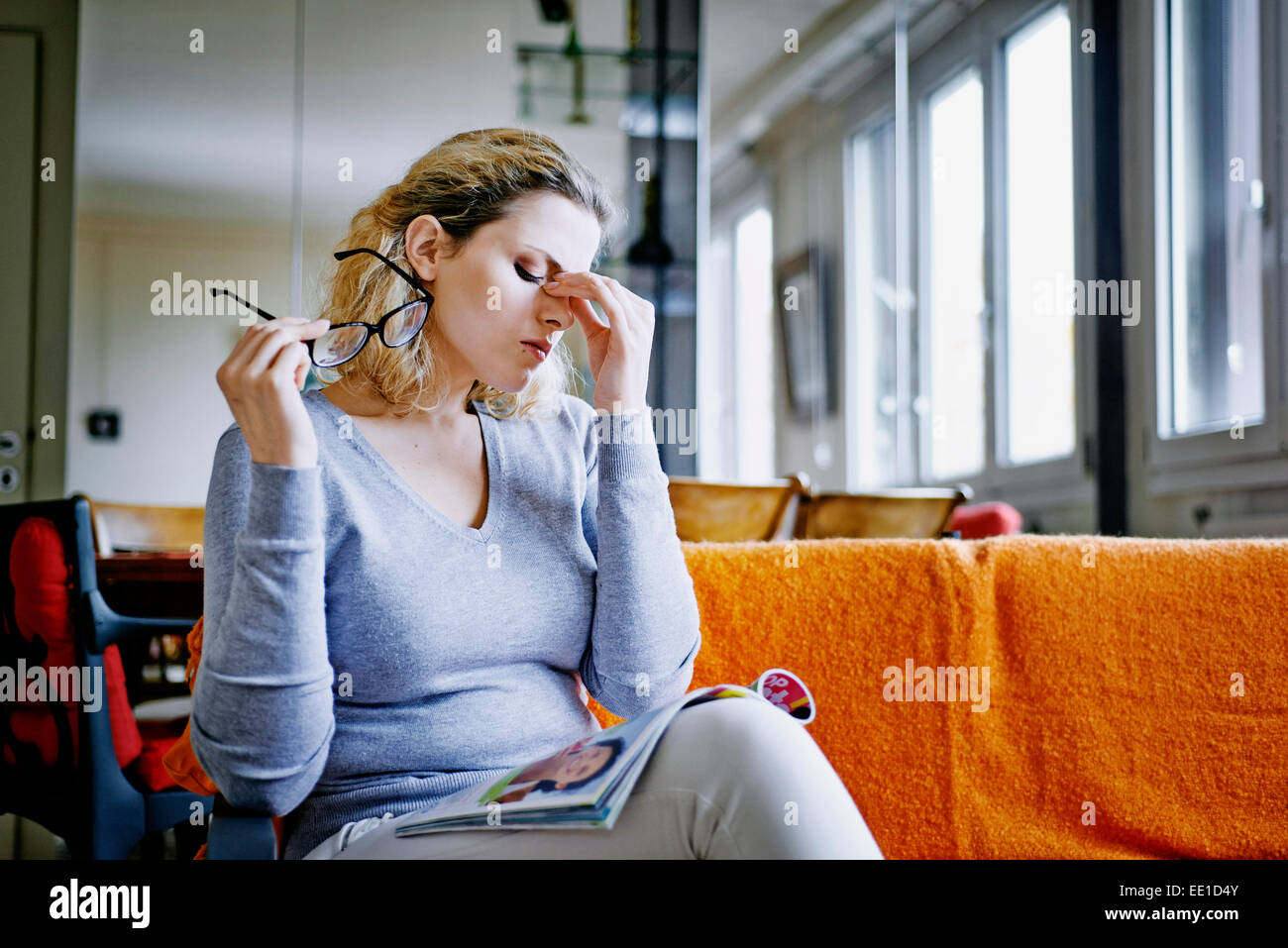Woman tired sofa mature hi-res stock photography and images - Alamy