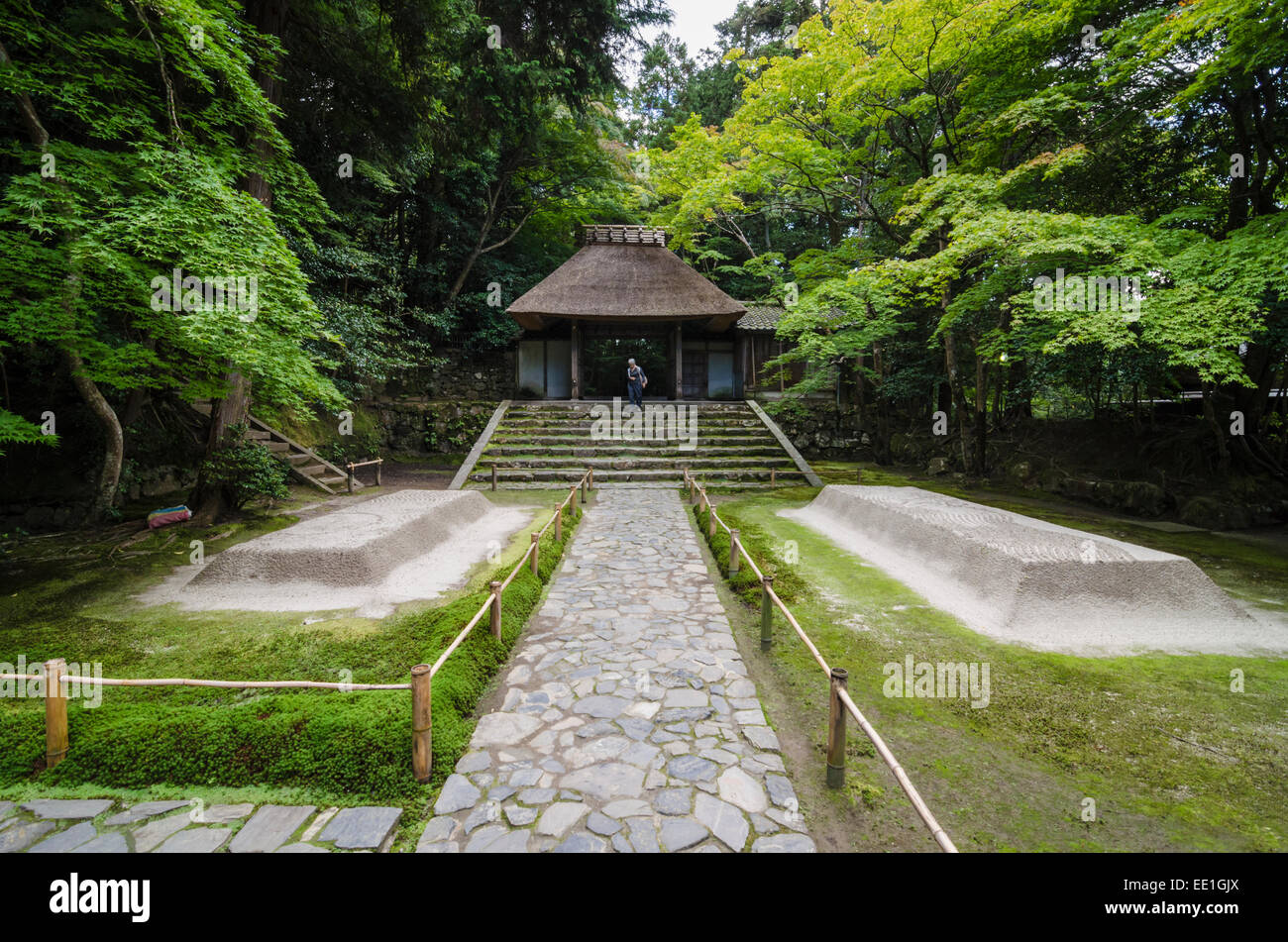 Two raked sand mounds inside the entrance gate of the Honen-in Temple, Kyoto, Kansai, Japan Stock Photo
