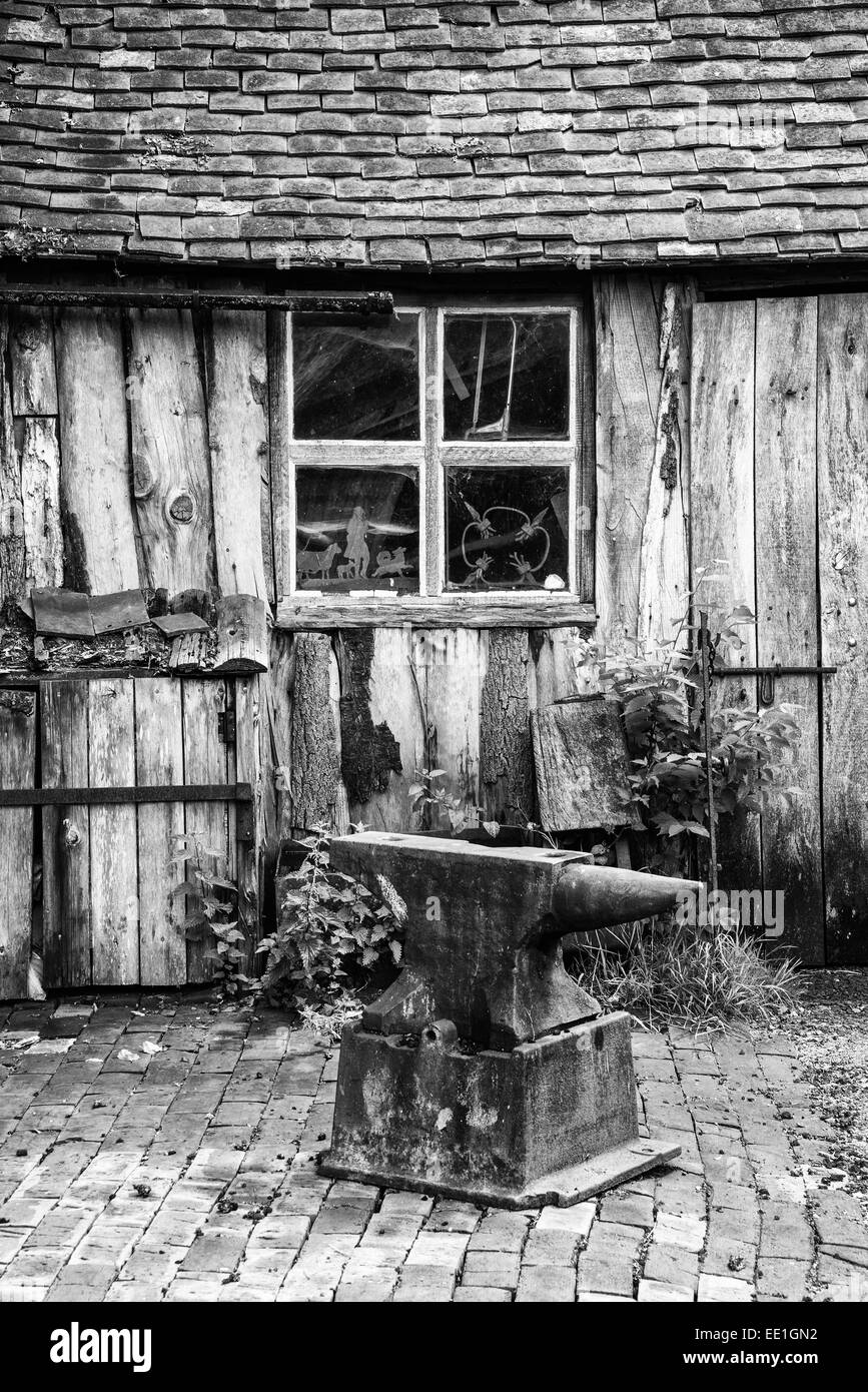 Black and white landscape of old blacksmiths workshop in Victorian era Stock Photo