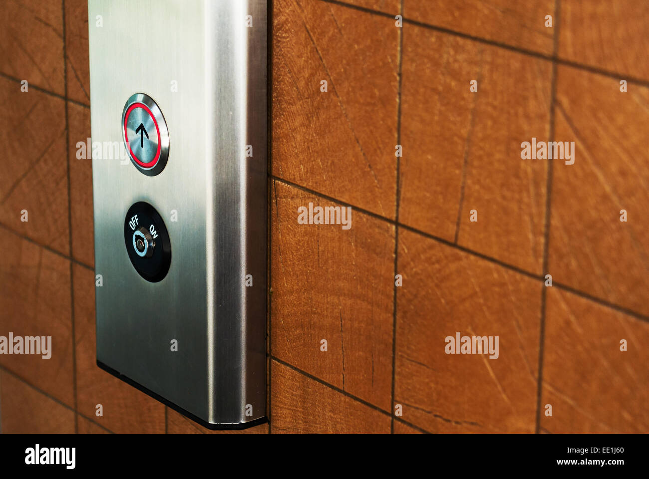 Elevator Button up and down direction Stock Photo - Alamy