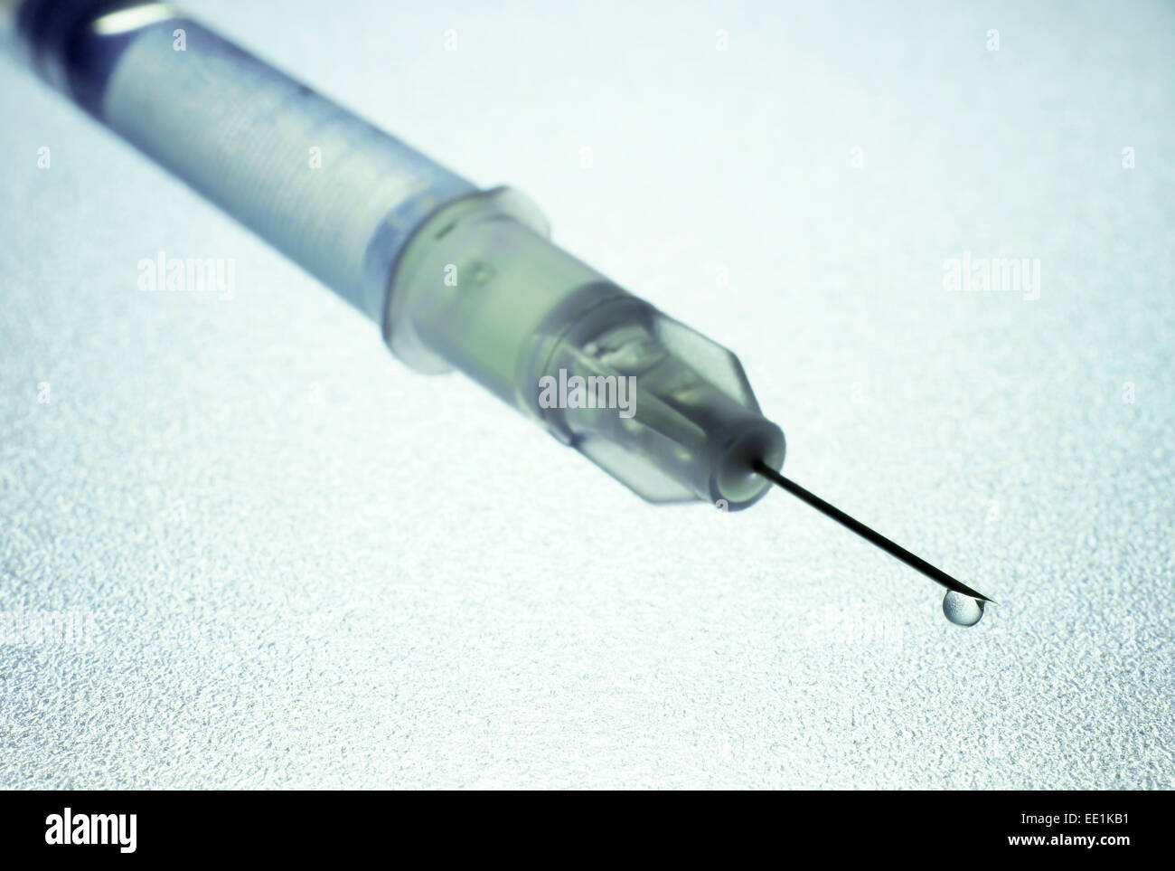 insulin syringe with a drop. Selective focus. Diabetes concept Stock Photo