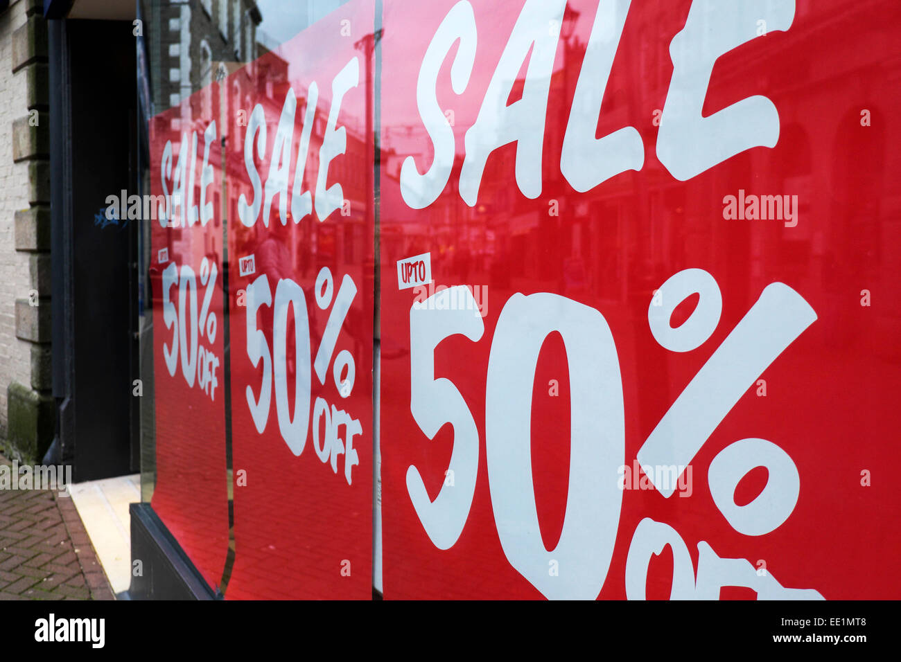 A sale sign in a shop window. Stock Photo