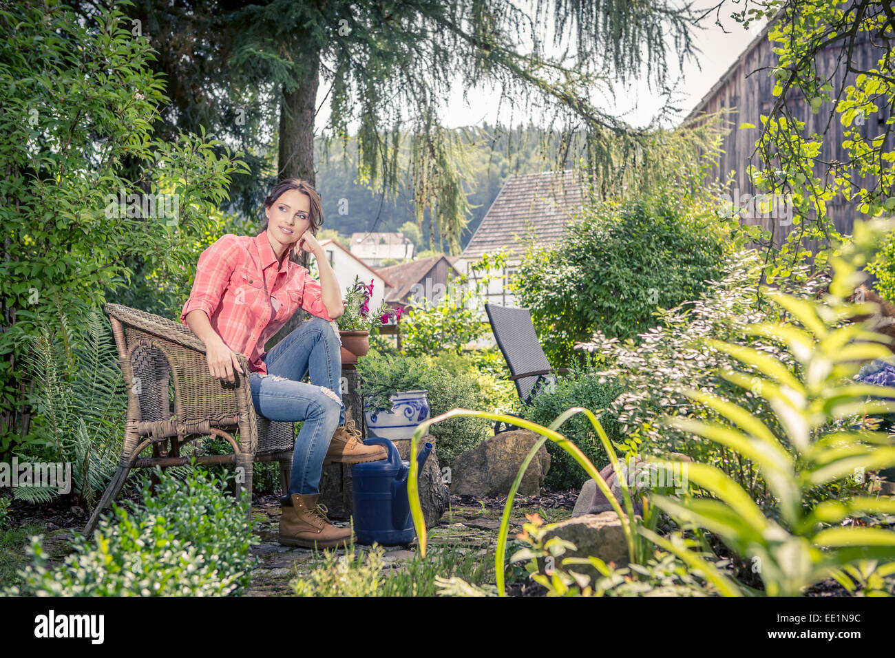 portrait of a young woman in the garden Stock Photo - Alamy