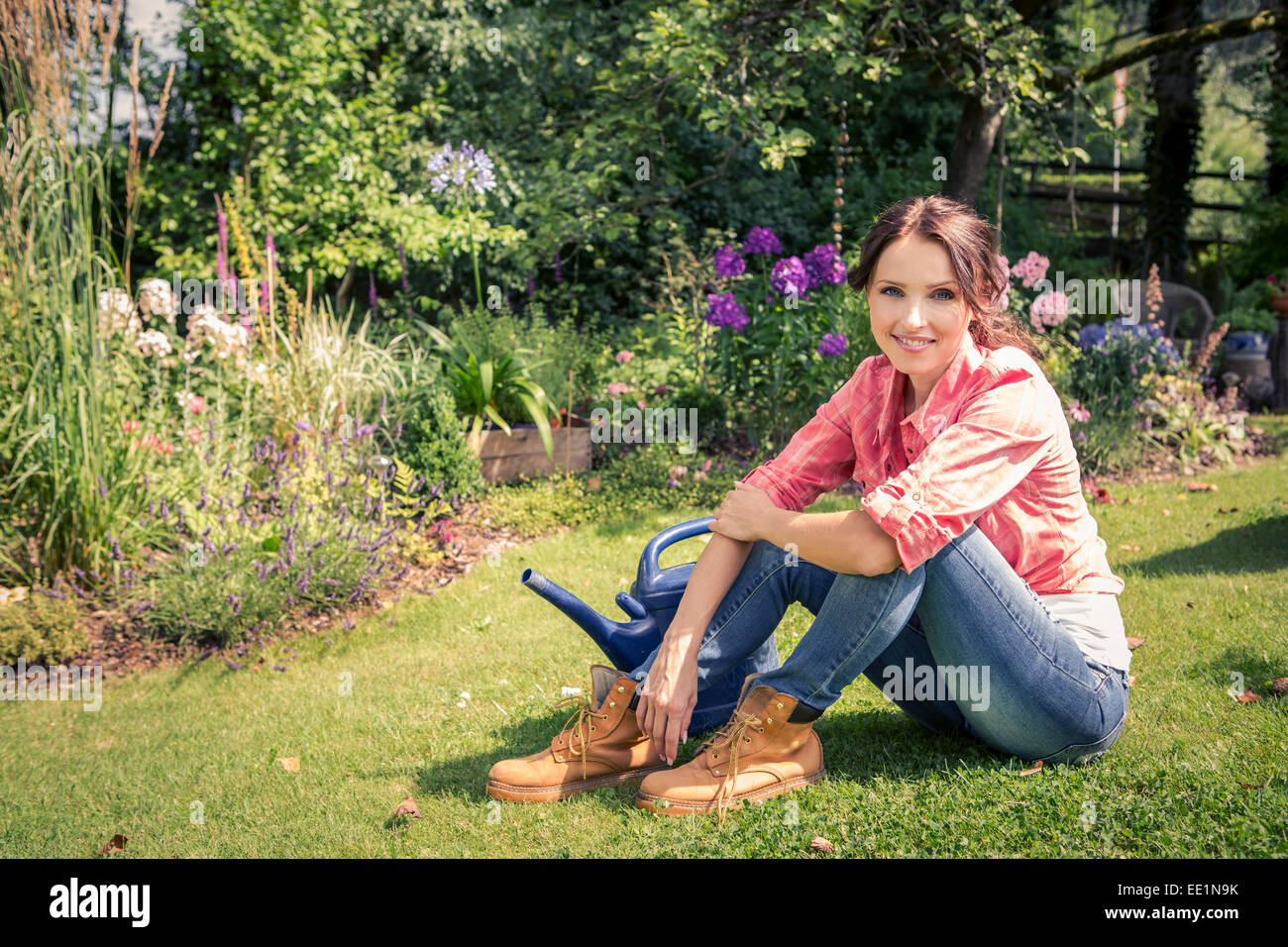portrait of a young woman in the garden Stock Photo - Alamy