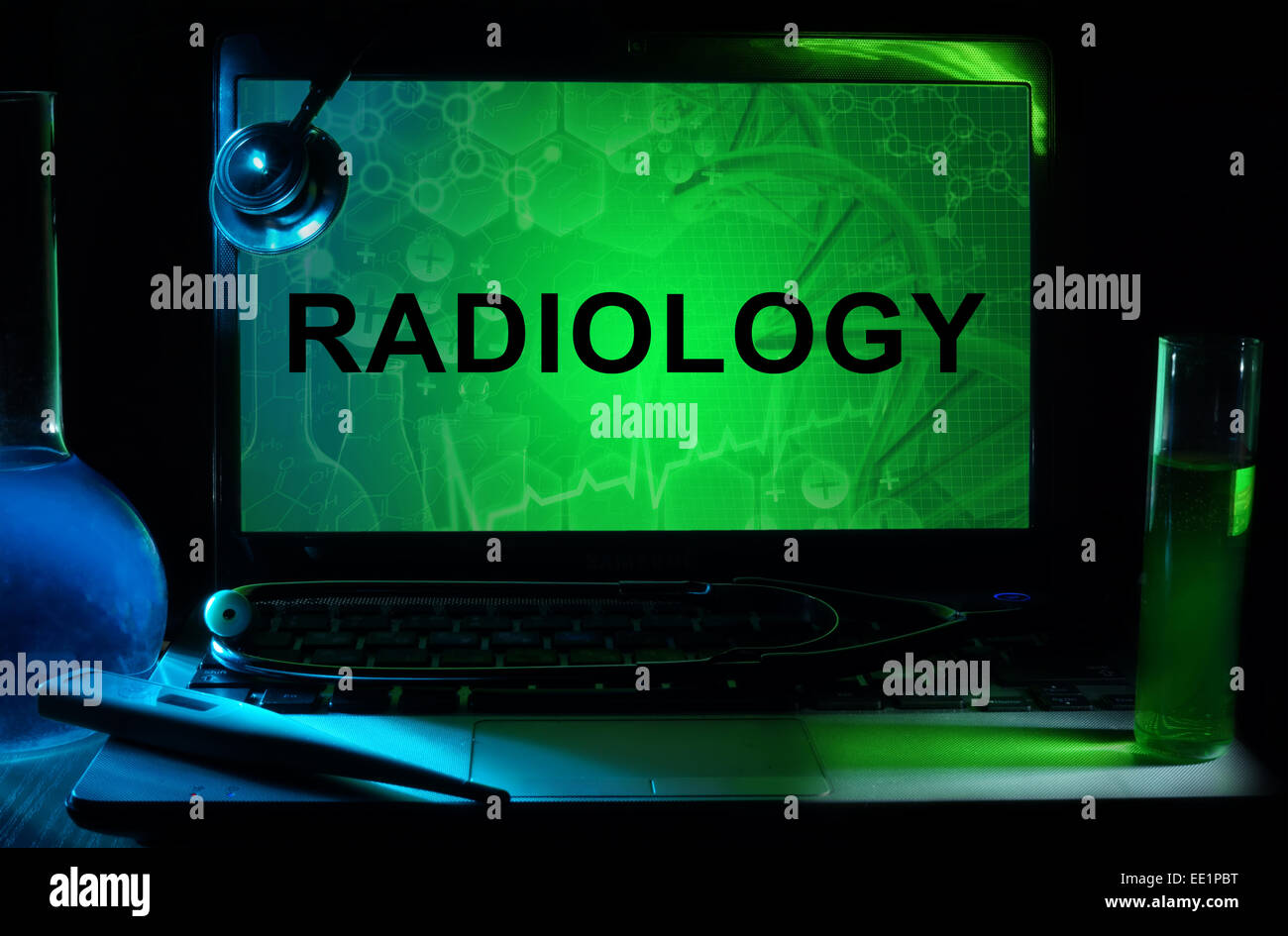 Notebook with words  radiology, test tubes and stethoscope Stock Photo