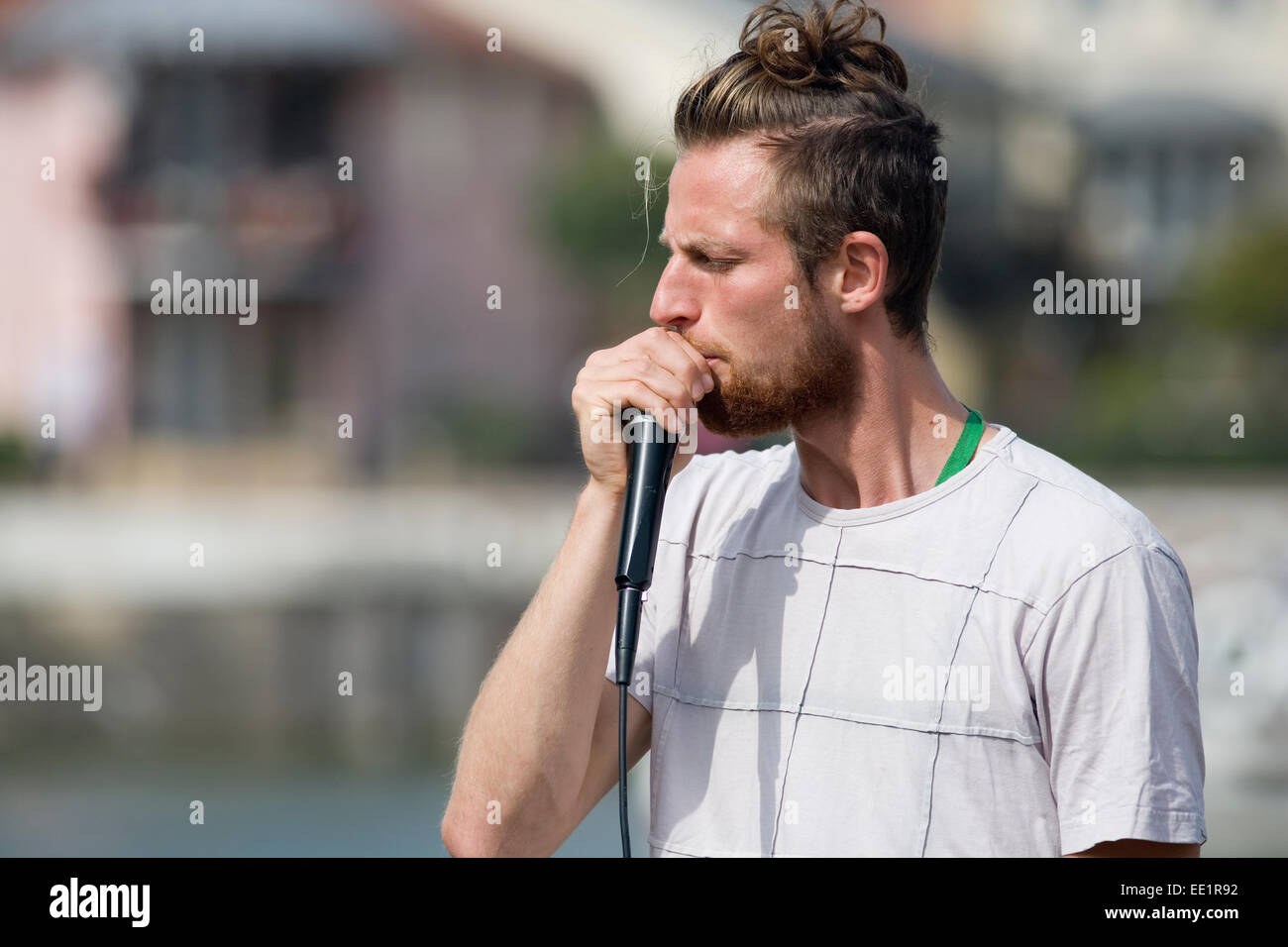 A Busker at a Dragon Boat Event, Bristol. Stock Photo