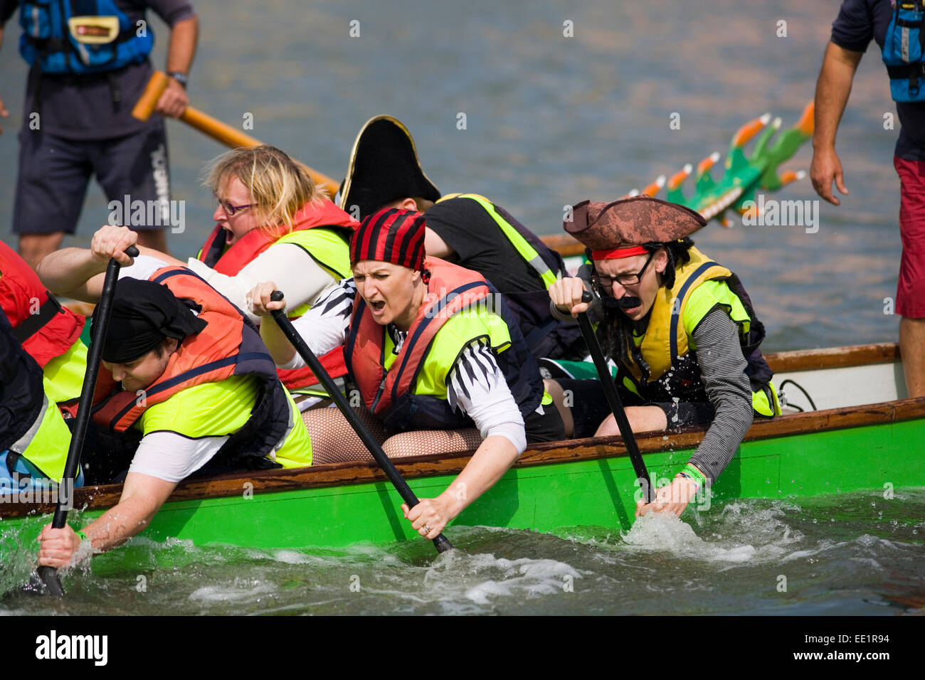 Competitors dressed as pirates during a Dragon Boat race, Bristol. Stock Photo