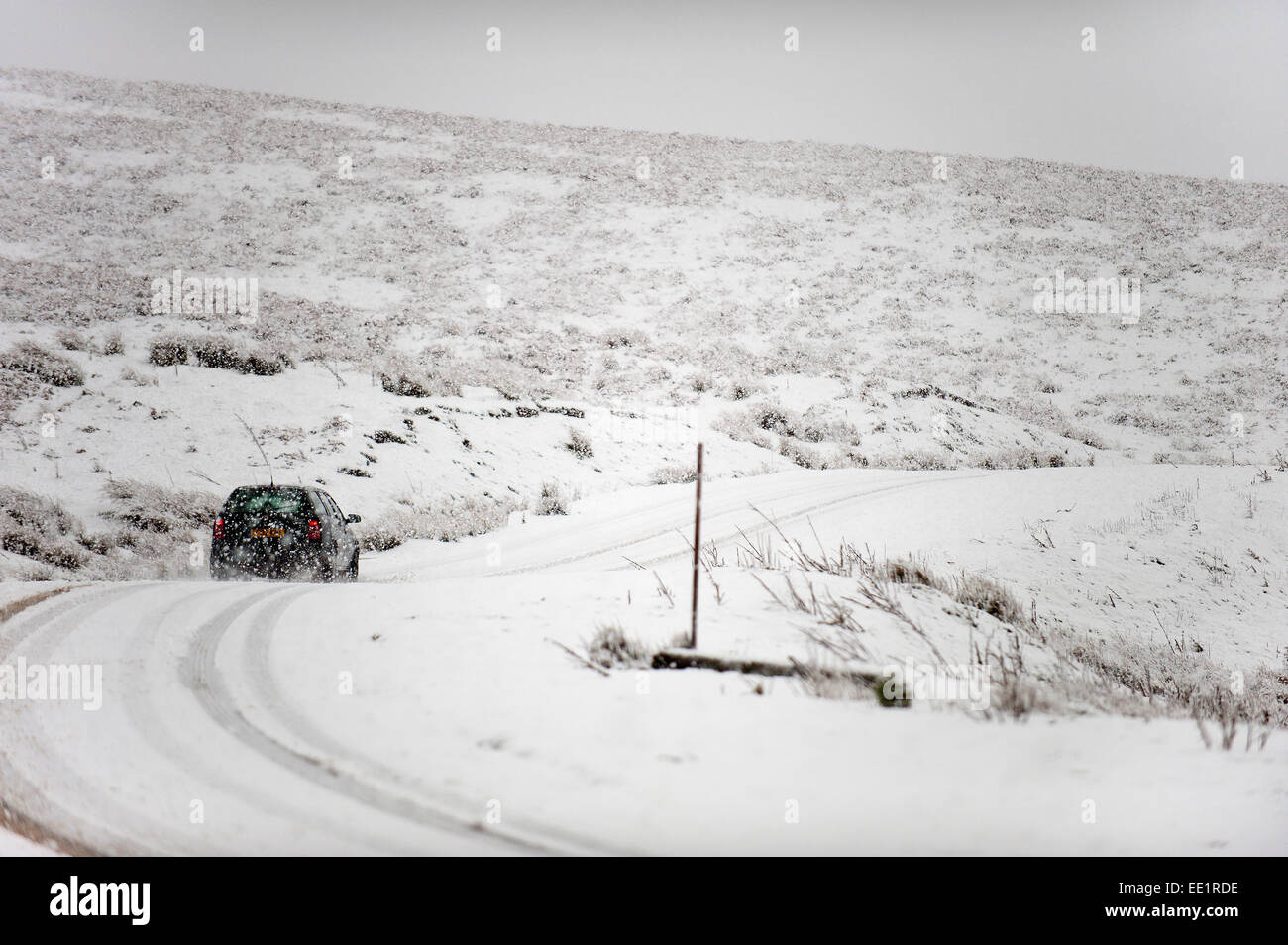 Mynydd Epynt Range of hills, Powys, Wales,  UK. 13th January, 2015. Snow falls in Mid Wales as predicted by the weather forecasts. Credit:  Graham M. Lawrence/Alamy Live News. Stock Photo