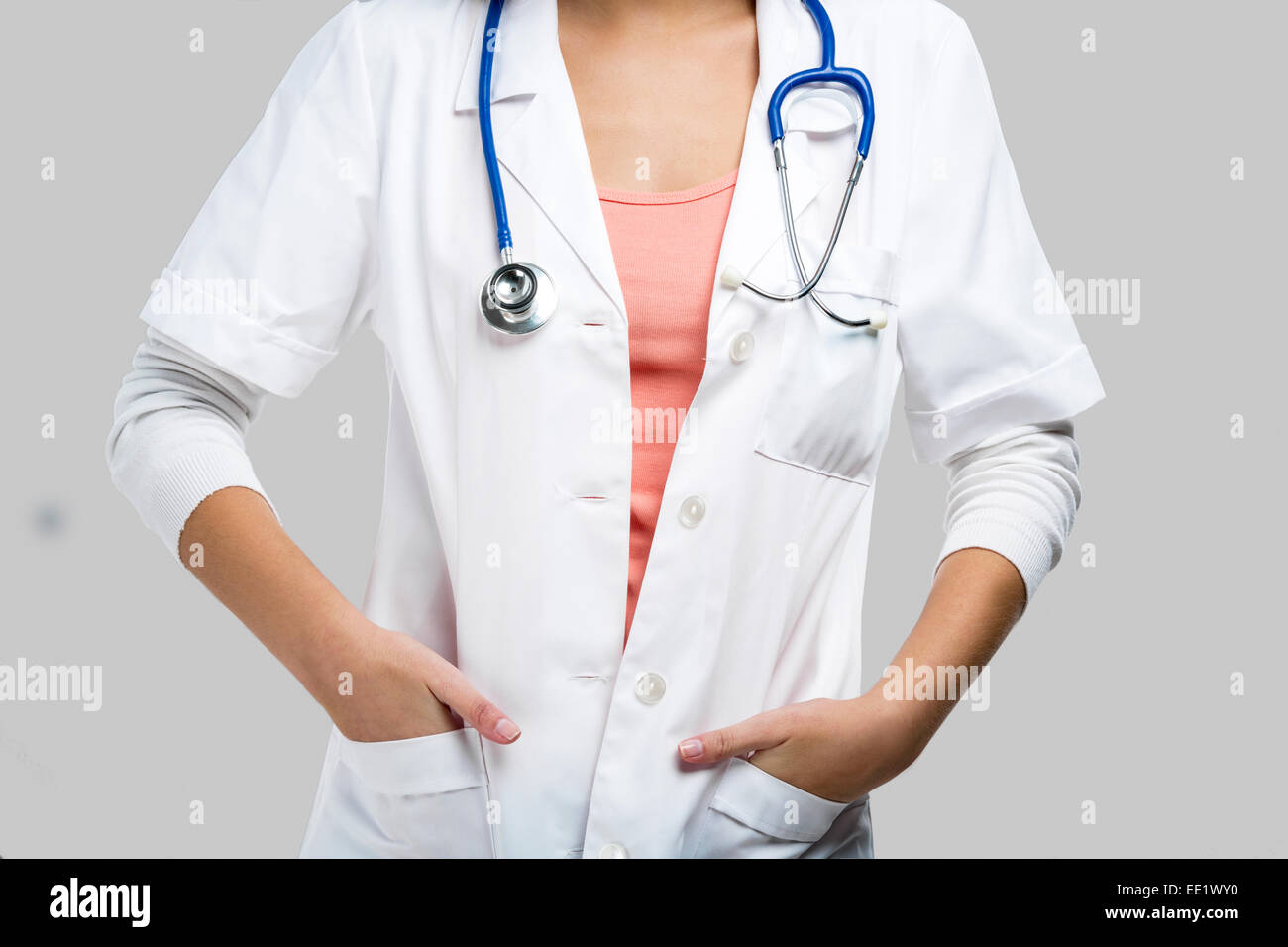 Beautiful and attractive female doctor, isolated over a white background Stock Photo