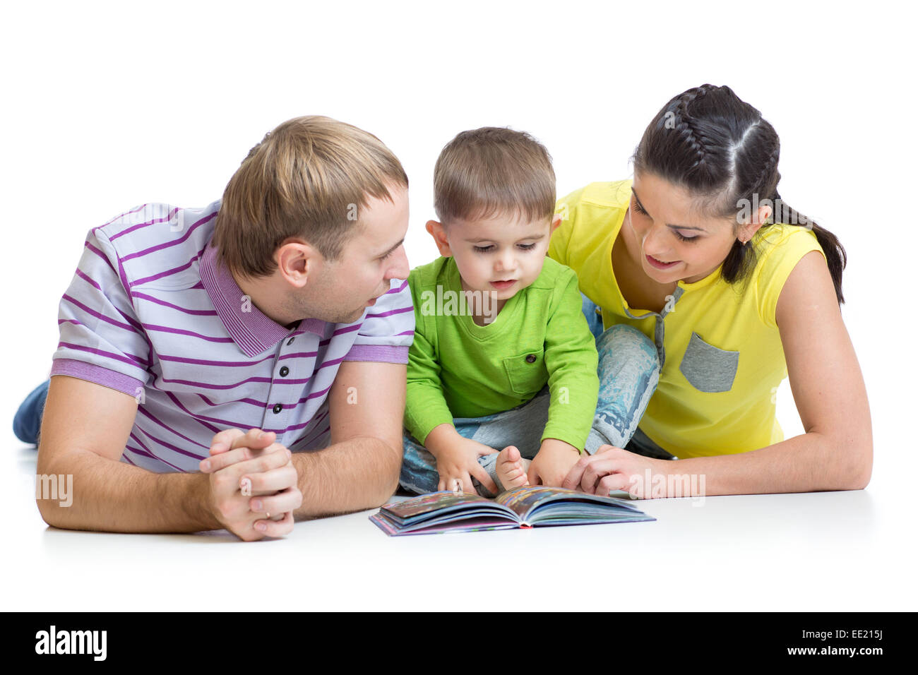 family with kid son read children book Stock Photo
