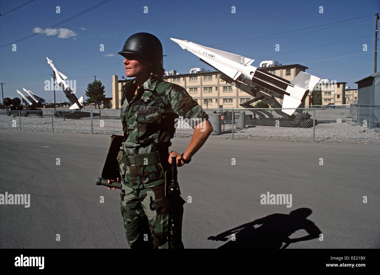 MILITARY POLICEWOMAN IN FRONT OF NIKE MISSILES, FORT BLISS, UNITED STATES ARMY, TEXAS, USA Stock Photo