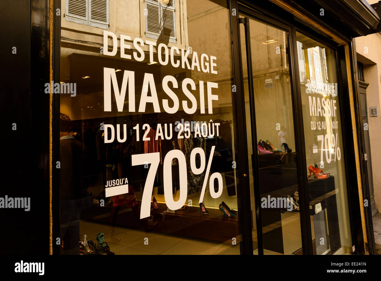 https://c8.alamy.com/comp/EE241N/stock-clearance-up-75-sale-sign-in-a-shoe-retail-shop-in-aix-en-provence-EE241N.jpg