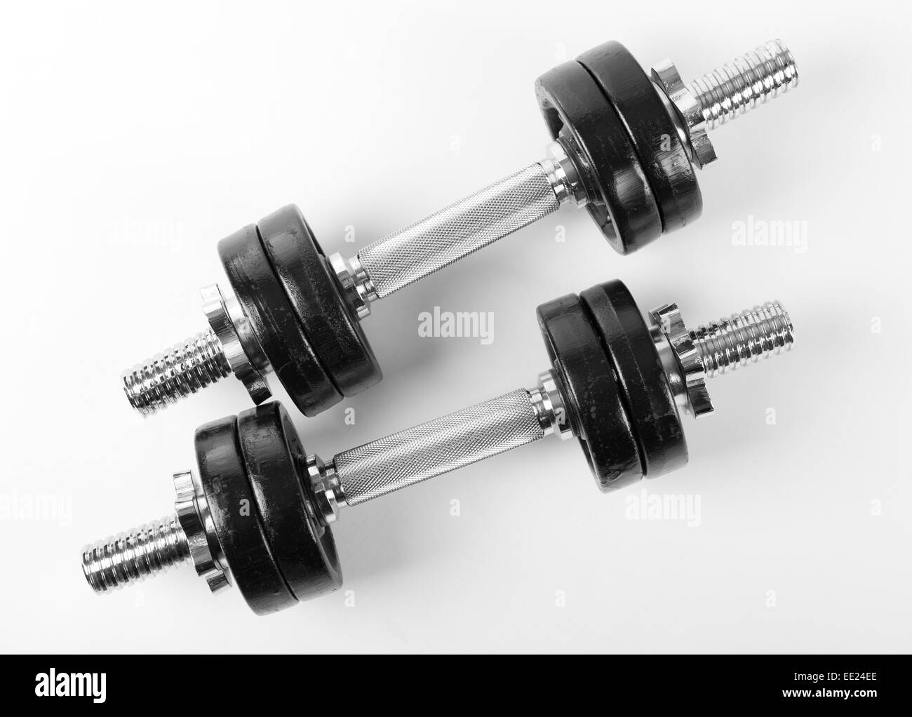 Chrome two hand barbells black weights Stock Photo Alamy