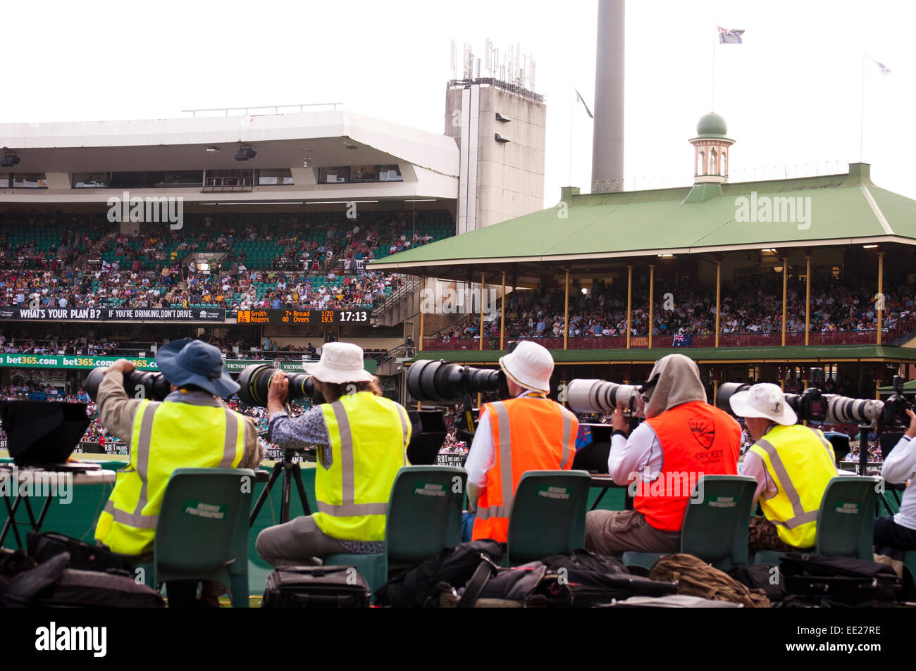 SYDNEY,AUSTRALIA - JANUARY 4: Sports photographers lined up to capture live action in the 2nd day of the last Ashes Test at Sydn Stock Photo