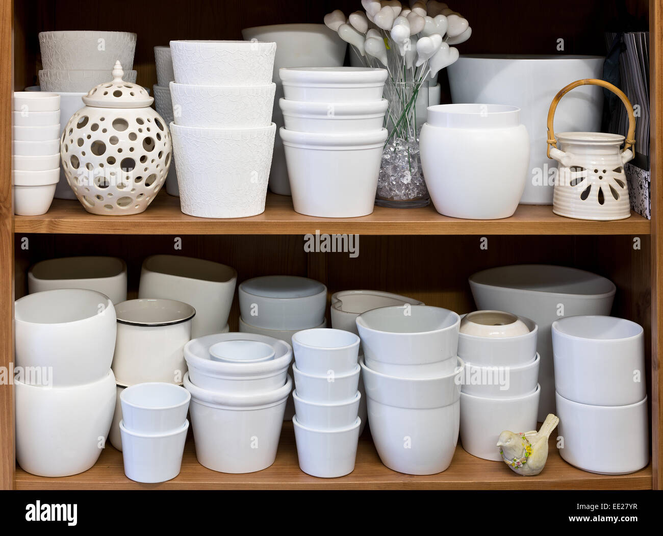 new ceramic flowerpots in the florist store Stock Photo