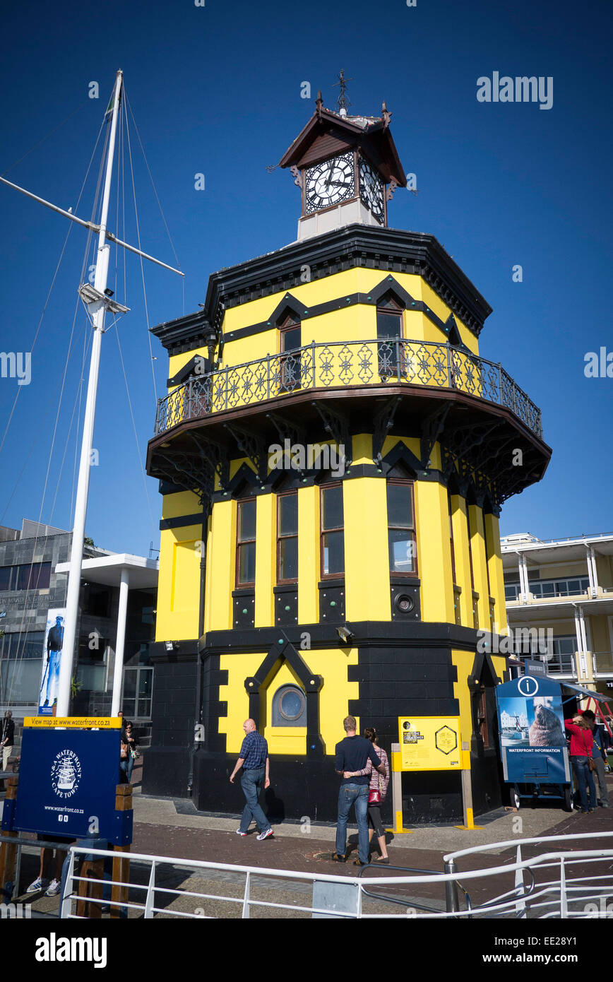 The clock tower at the V&A Waterfront on Cape Town, South Africa. Painted yellow for 2014 instead of the normal red. Stock Photo