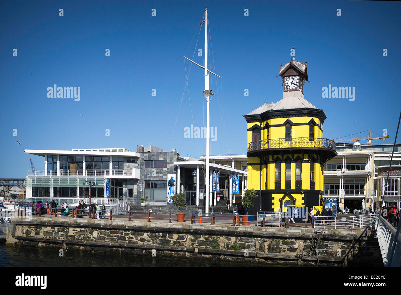 The clock tower at the V&A Waterfront on Cape Town, South Africa, and the Nelson Mandela Gateway to Robben Island Stock Photo