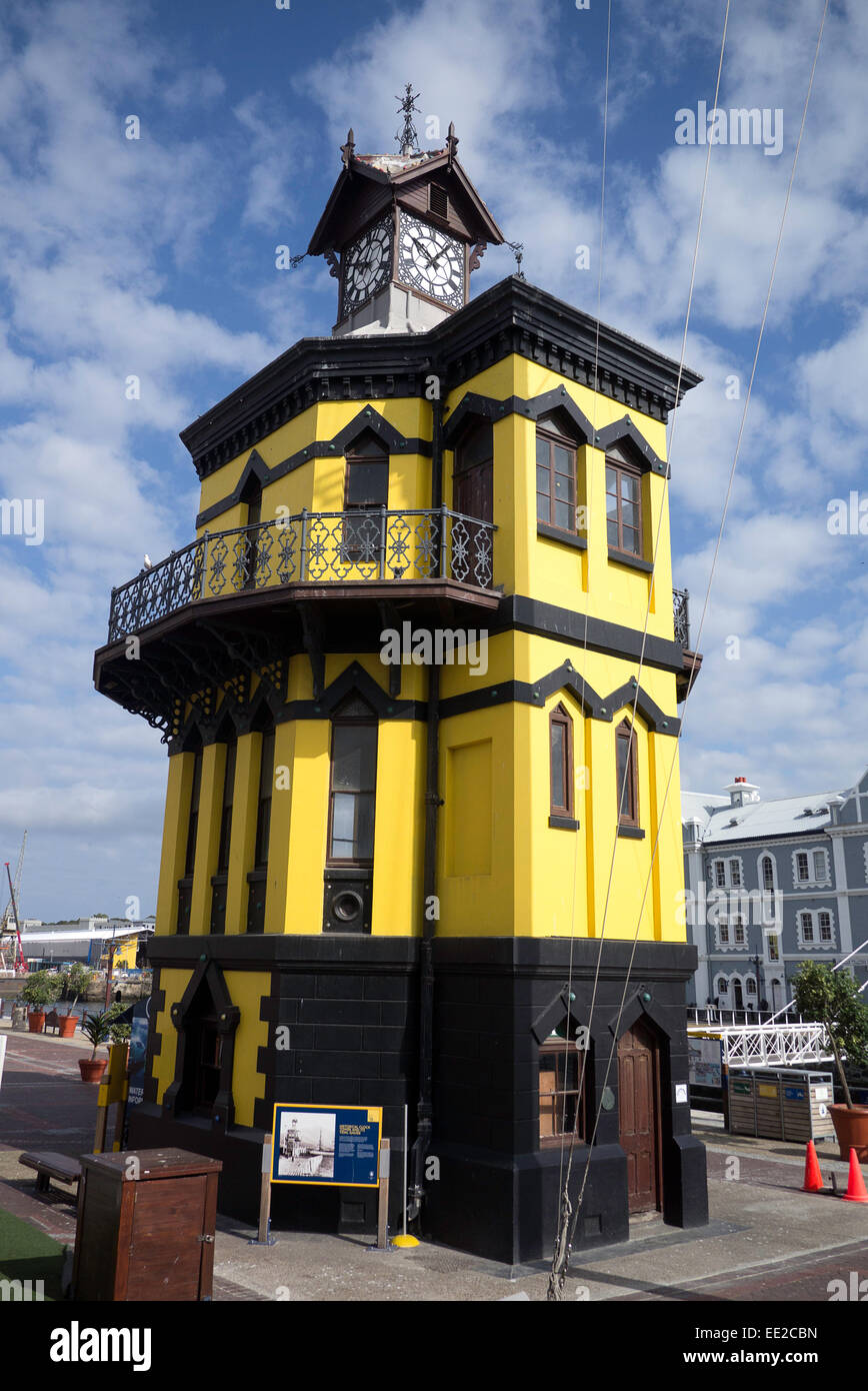 The clock tower at the V&A Waterfront on Cape Town, South Africa. Painted yellow for 2014 instead of the normal red. Stock Photo