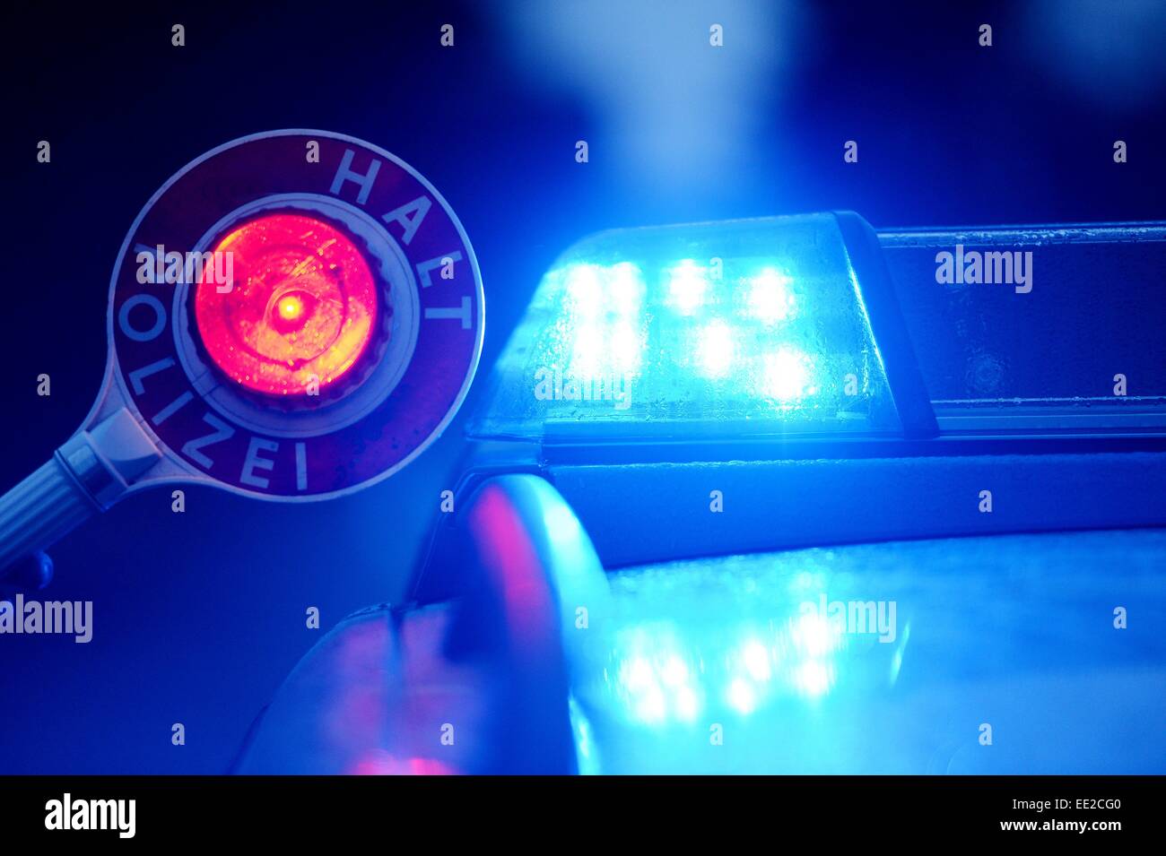 Police Stop sign and blue light, Germany, city of Braunlage, 12. January 2015. Photo: Frank May Stock Photo