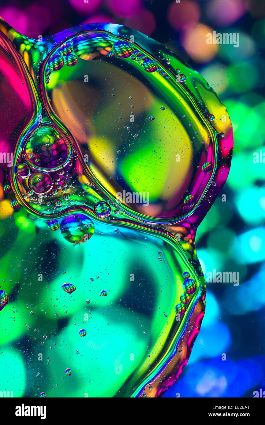 Abstract oil and water pattern.  Rainbow coloured background shapes. Stock Photo