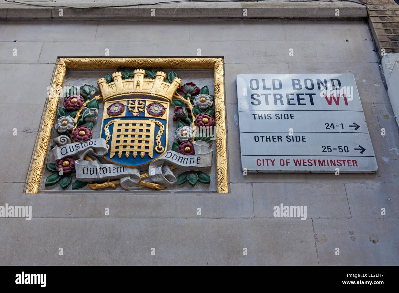 London, Old Bond Street    A road sign with accompanying coat of arms Stock Photo
