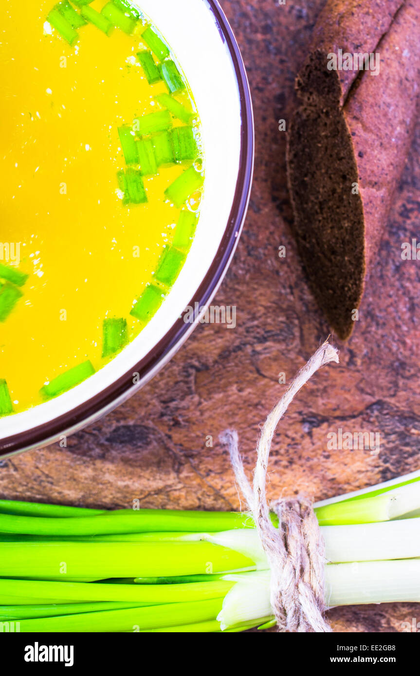 Chicken broth soup with herbs Stock Photo