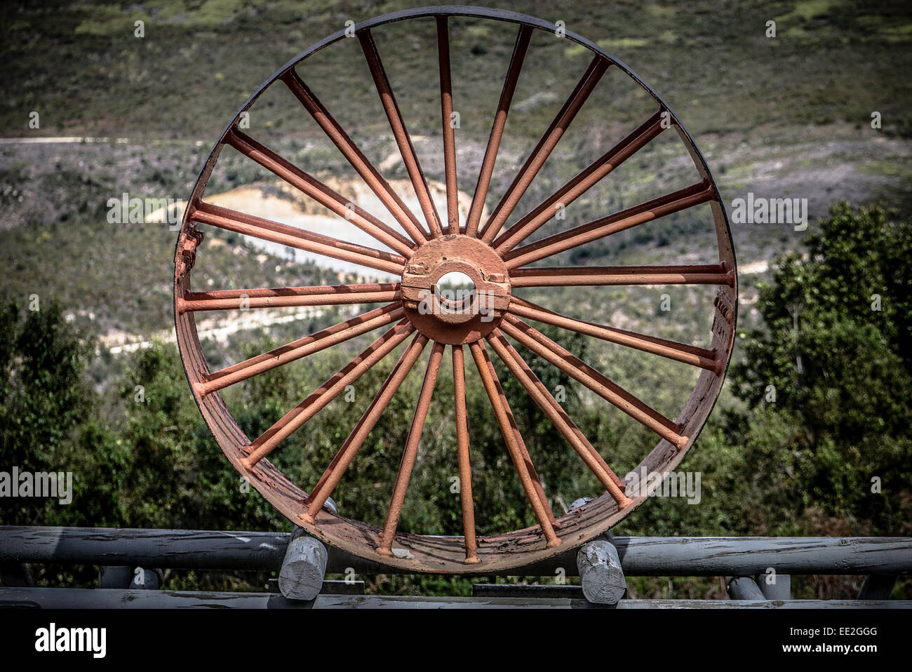 Cast -iron machine wheel at Bendigo gold mine in the Knysna Forest, part of the Garden Route National Park, South Africa. Stock Photo