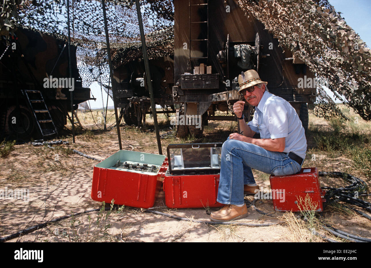 CIVILIAN ENGINEER TESTING LAUNCH SEQUENCE OF MULTIPLE ROCKET LAUNCHER