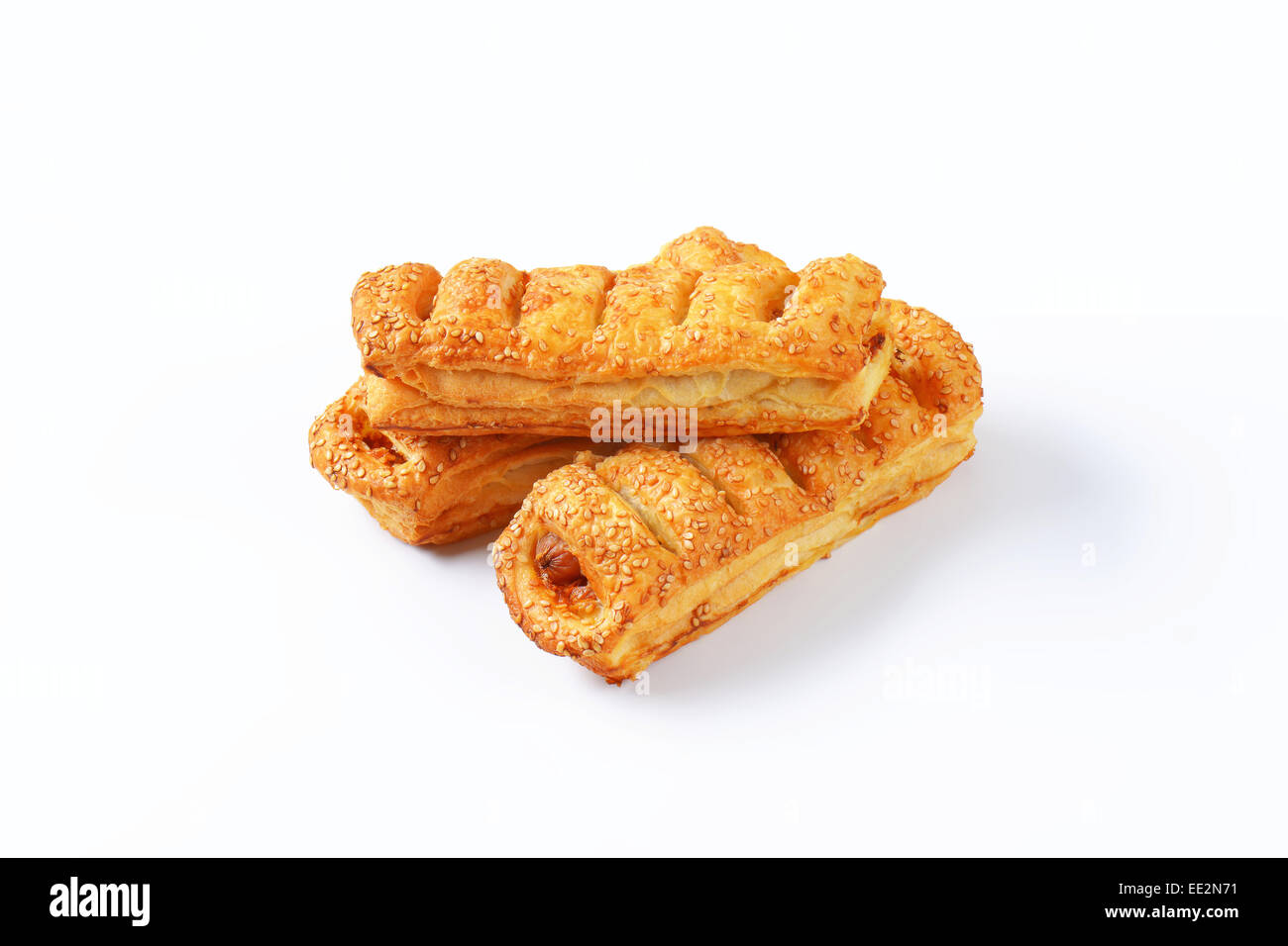 Sausage rolls topped with sesame seeds Stock Photo Alamy