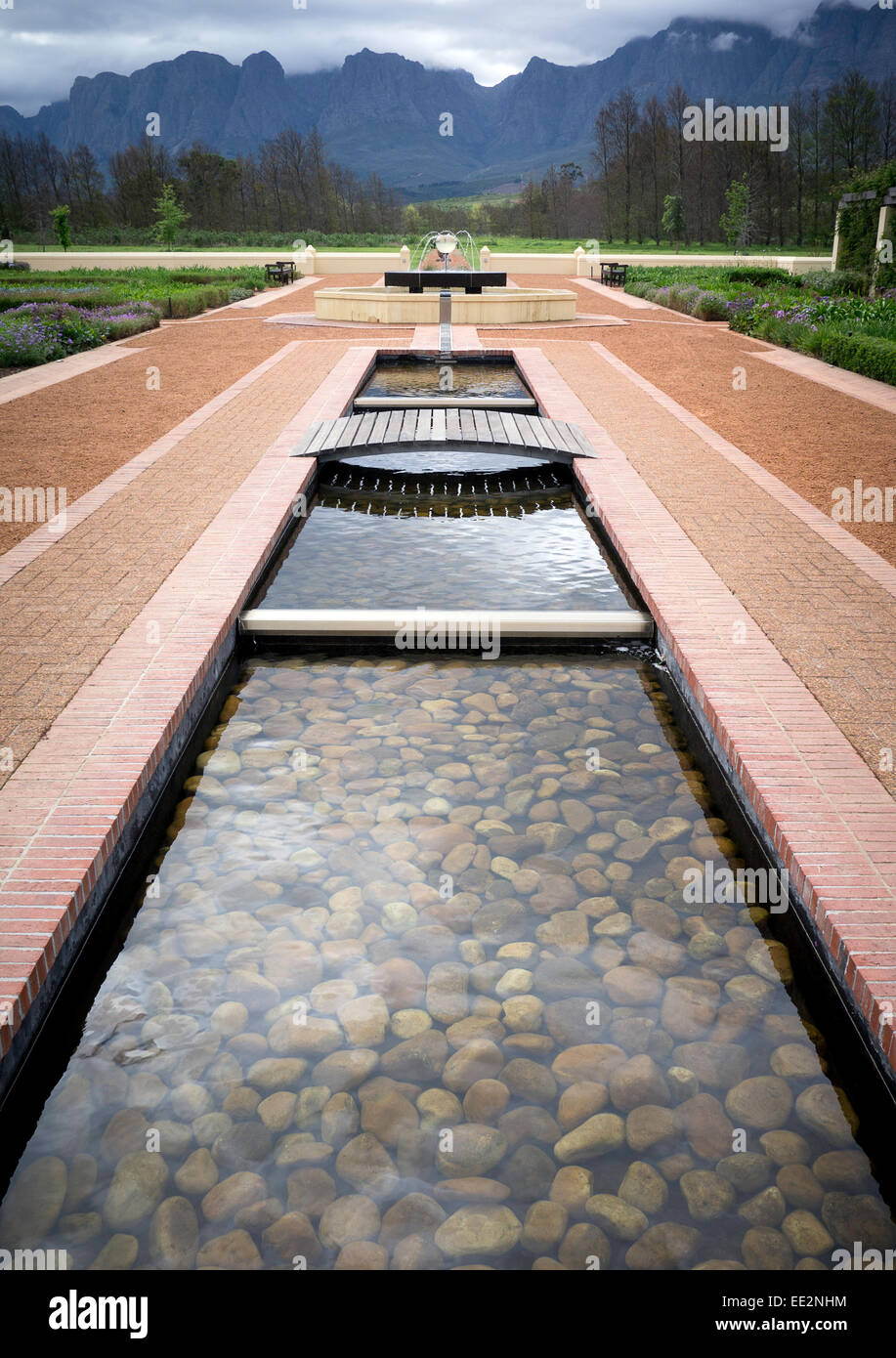 Water features and gardens at the Vergelegen wine estate in the Western Cape, South Africa. Distant Hottentots-Holland mountains Stock Photo