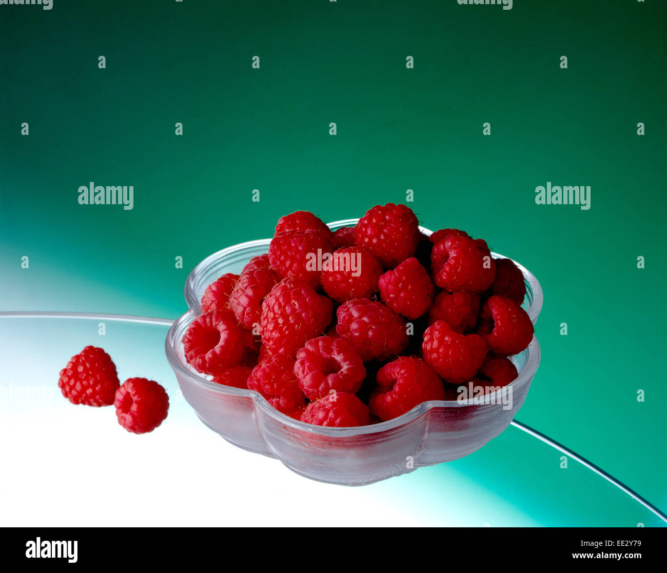 raspberries in glass bowl Stock Photo