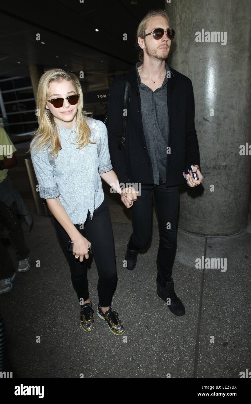 Chloe Grace Moretz arrives hand-in-hand with big brother Trevor for If I  Stay premiere