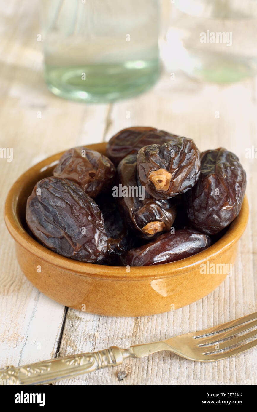 Dried dates the fruit of the date palm Phoenix dactylifera Stock Photo