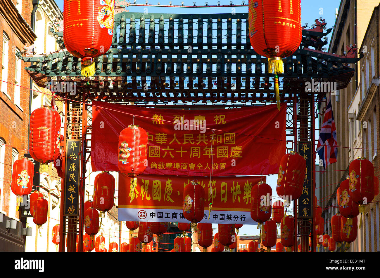 During Chinese New Year, the gates at the ends of Gerrard Street are decorated with red and gold banners, lanterns and bunting. Stock Photo