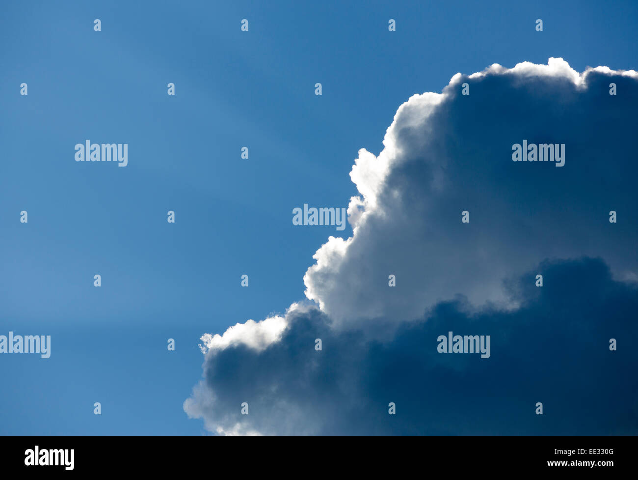 Sun rays behind dark cloud , Finland Stock Photo - Alamy