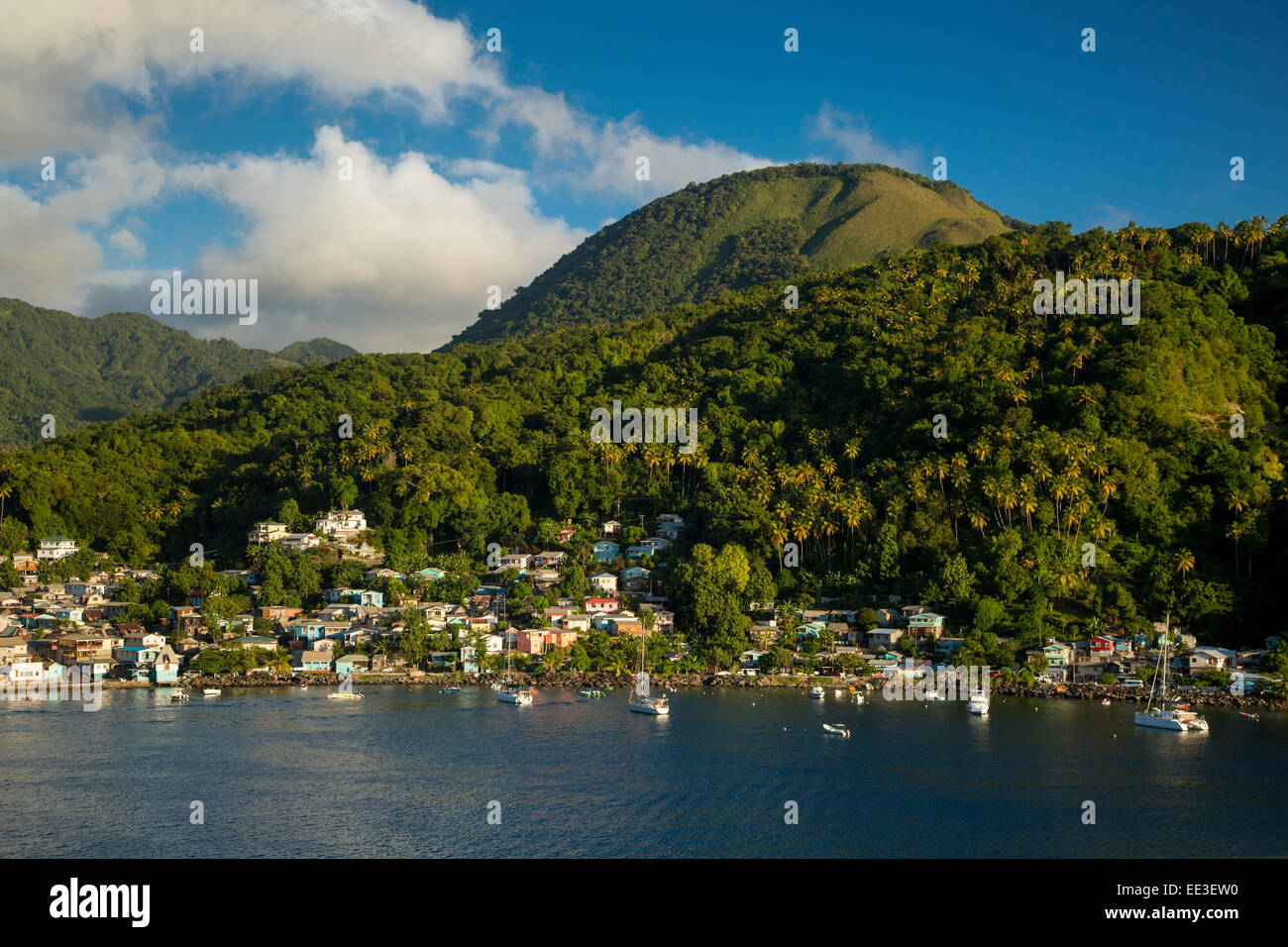 Evening sunlight over the green hills surrounding Soufriere, St Lucia, West Indies Stock Photo