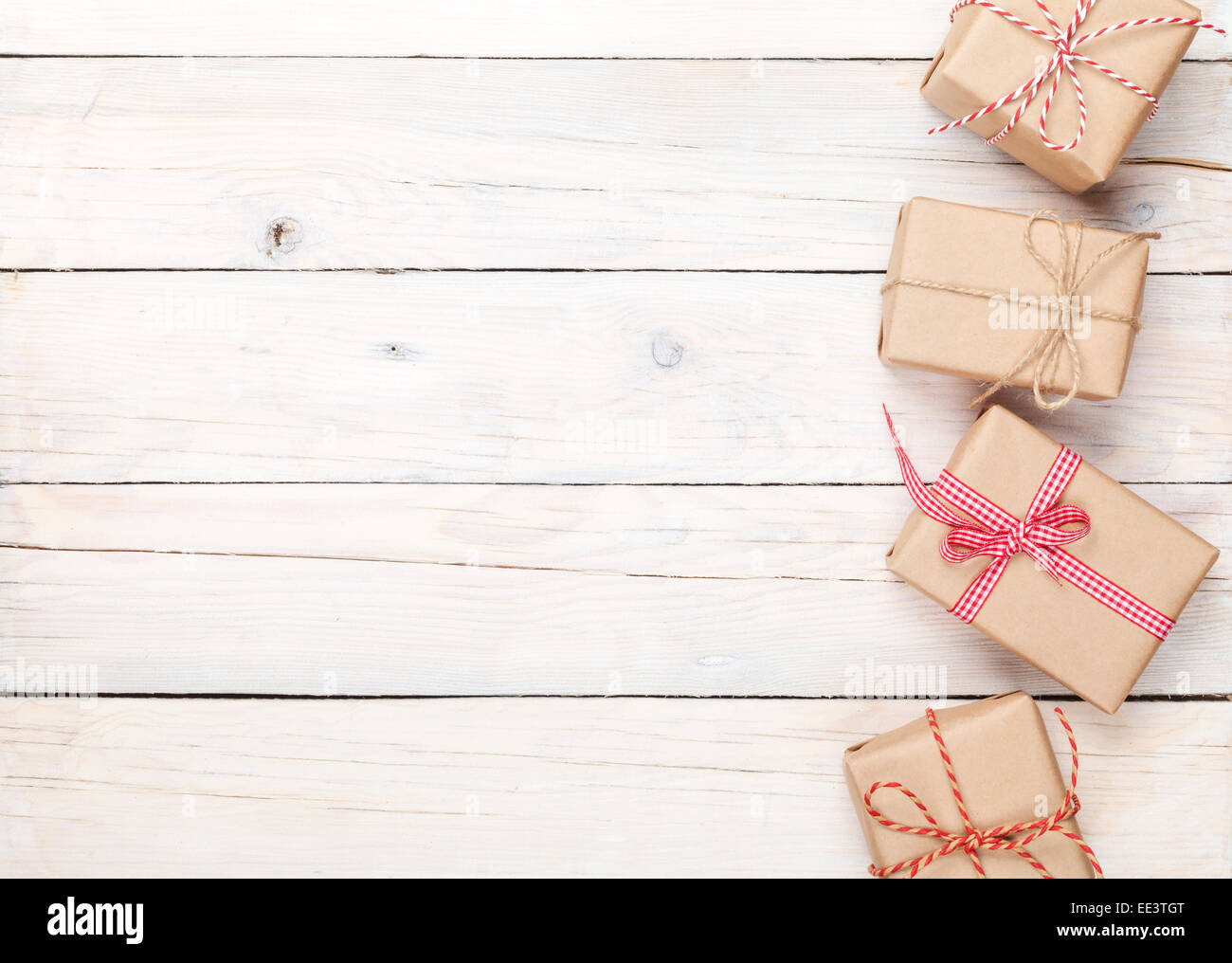 Gift boxes on wooden table background with copy space Stock Photo - Alamy