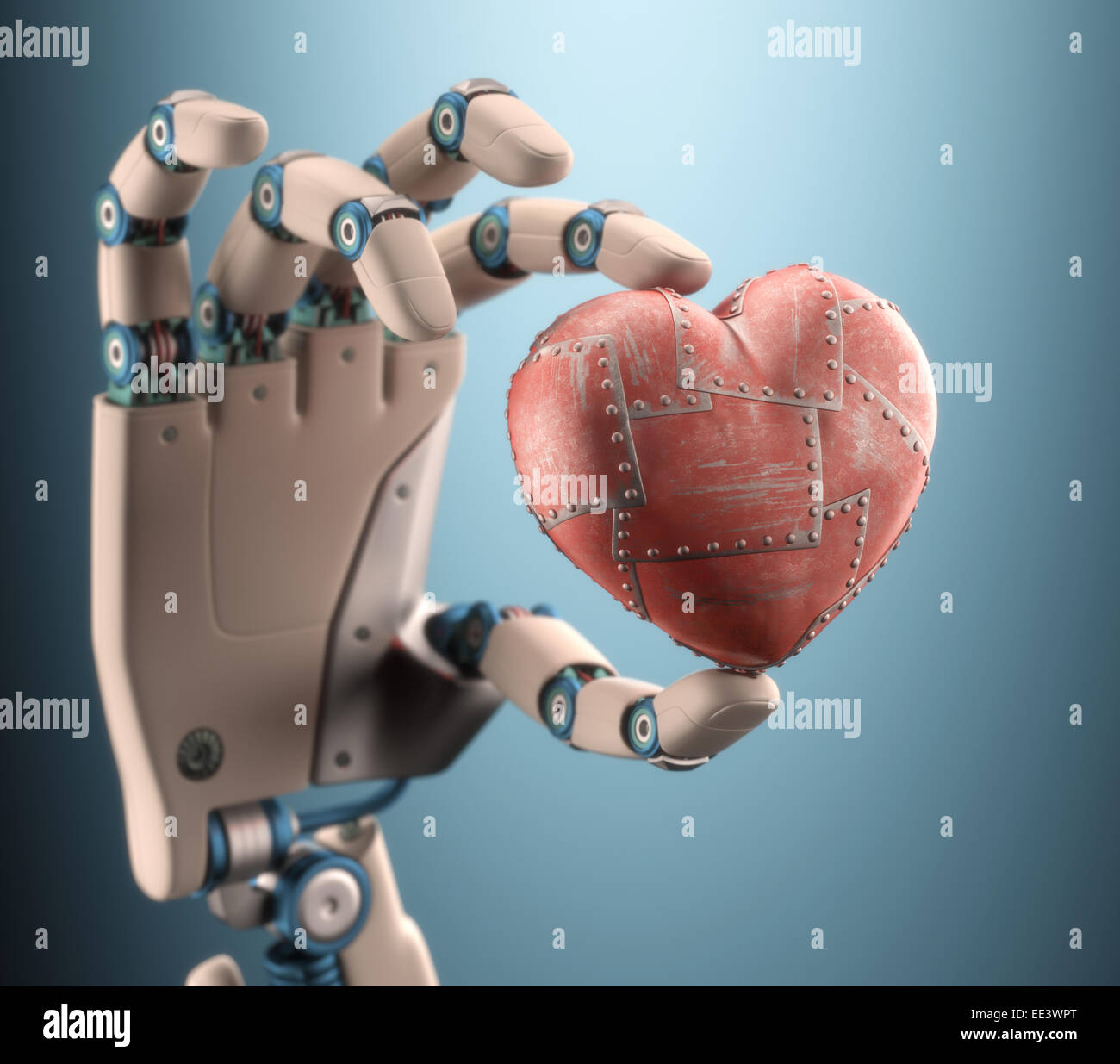 Robot hand holding a metal heart. Clipping path included. Stock Photo
